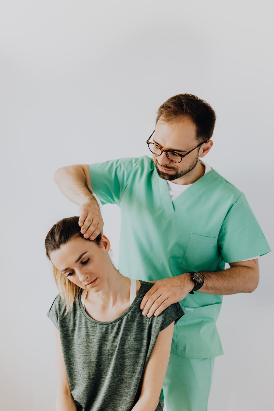 Chiropractor performing a gentle neck mobilization